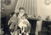 Santa Claus and two small children