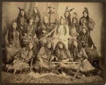 Group portrait of bohemians dressed as frontiersman and Native American women