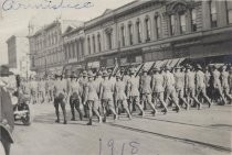 Soldiers marching in Armistice Day Parade, Second Street