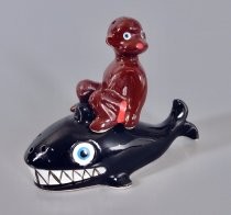 Child on a whale salt & pepper shakers