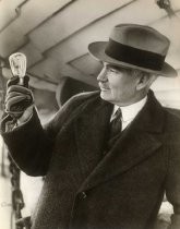 Lee de Forest, with his 1906 Audion tube, in 1925