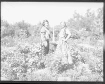 Two women dressed for Fiesta de las Rosas