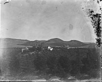 Farm and orchard set on a hill, c. 1912