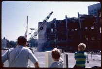 Spectators watching demolition