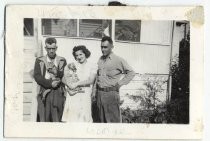 John, Yvonne and George Mendoza with cat and dog