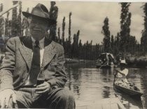 Lee de Forest enjoying a soda on a canal in Xochimilco, Mexico