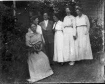 Group portrait outside building, c. 1912