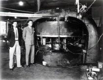 Ernest Lawrence and Stanley Livingston with first large cyclotron