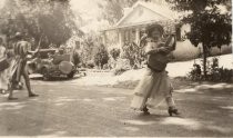 Henrietta Escobar (Bernal) playing the guitar in New Almaden parade