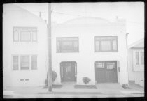 No. 462, a two-story stucco residence on city street