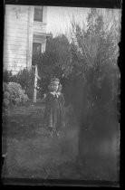 Young girl in checkered dress