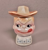 Cowboy kid saltshaker and eggcup