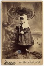 Portrait of child with parasol