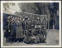 Group portrait at volleyball net