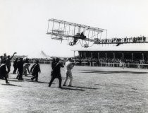 Bi-Plane in Flight at a Fair Grounds — Calisphere