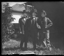 Three women dressed as men, c. 1900