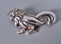 Silver bird brooch