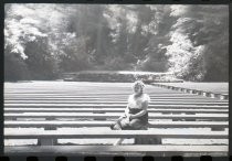 Woman seated at Armstrong Redwoods amphitheatre