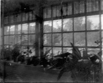 View through window with plants on sill, c. 1912