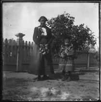 Woman and young girl holding roses