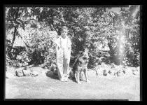 Boy with dog outside