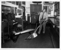 Clyde Arbuckle with Knapp Plow, Statehouse Replica Museum