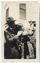 Claude and Velma Bernal, with a cat