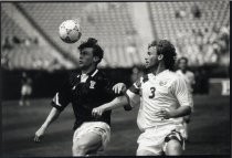 John Doyle Defends Against an Unidentified Scot During the Game