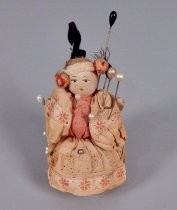 Chinese doll pincushion