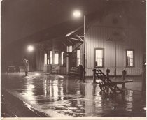 Man on Santa Clara depot platform on rainy night