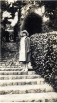 Woman on stone staircase