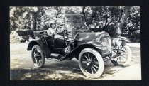 Woman at wheel of automobile, Winchester estate