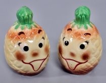 Pineapples with faces salt & pepper shakers