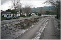 Flood debris on residential street. Possibly the 1998 El Nino Flood in California