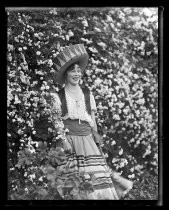 Woman posing in Fiesta de las Rosas costume