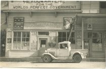 William Riker parked in front of Holy City building, c. 1935