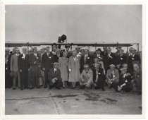 Early Birds of Aviation group portrait, in front of airplane