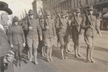 Soldiers marching in Armistice Day Parade