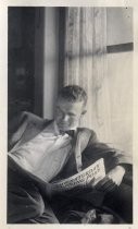 Harold Elliott as a young man, reading