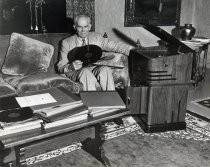 Lee de Forest listening to records in Hollywood home