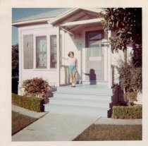 Lydia Sanchez outside her family home on Anita Street, San Jose