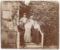 Robles family portrait on steps of house