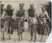 Four cyclists on bicycles, 1928