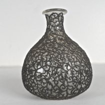 Vase with decorative metal mesh