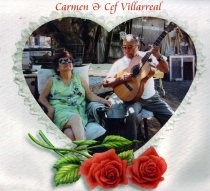 Carmen and Cef Villarreal singing and playing guitar