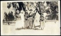 Six young women in assorted styles of clothing