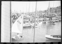 Marina parking lot and sailboats