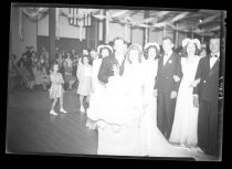 Bride and groom at wedding reception, c. 1940