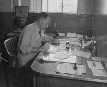 Ralph Rambo at his desk