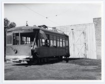 Derelict Trolley #163 parked in lot